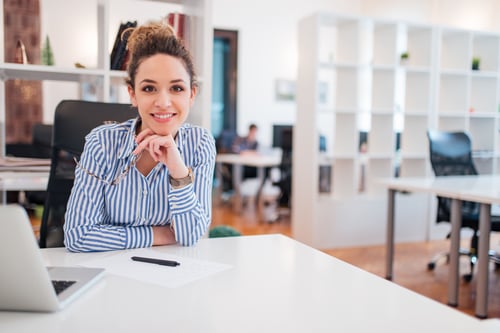 woman sitting at a desk