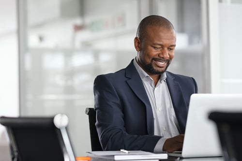 male professional working on a computer